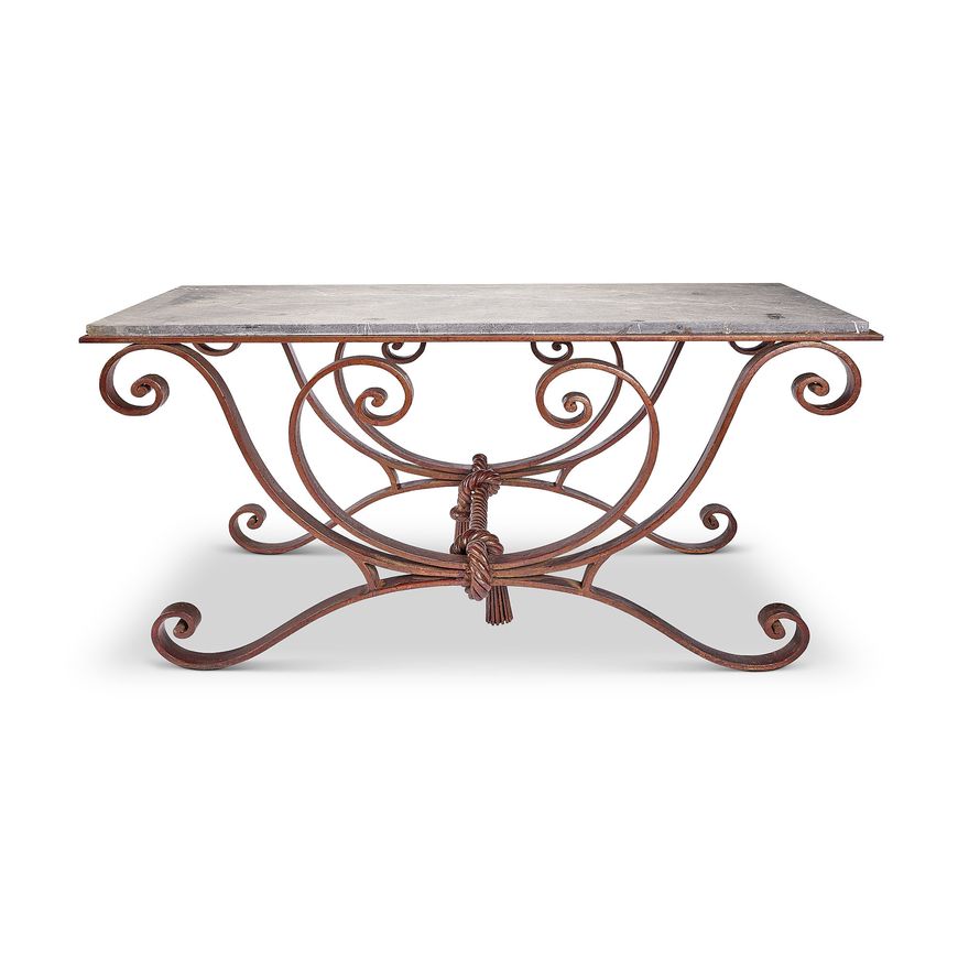 A mid 20th century wrought iron and marble low table in the manner of Gilbert Poillerat