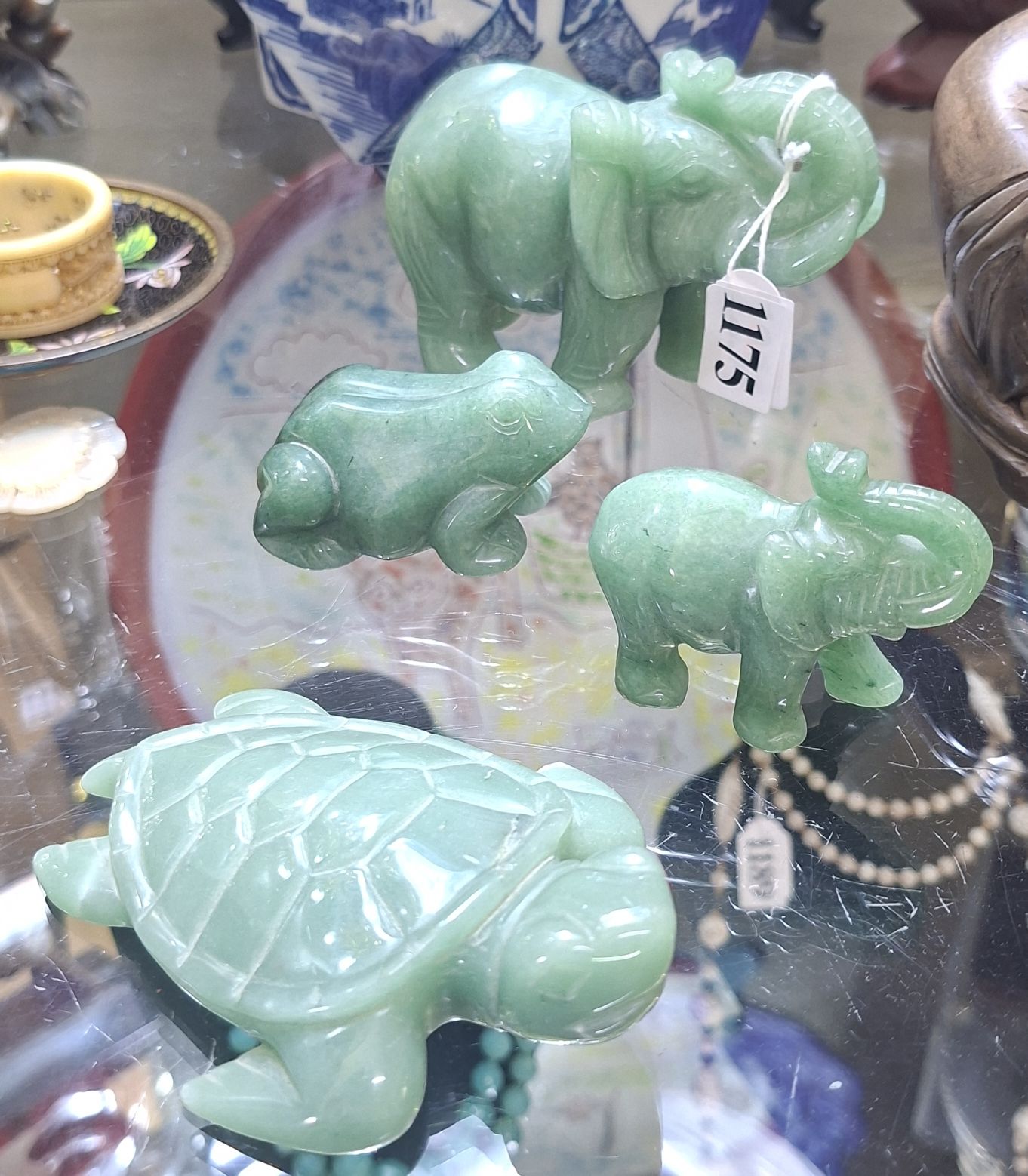 1175 · TWO CARVED JADE ELEPHANTS