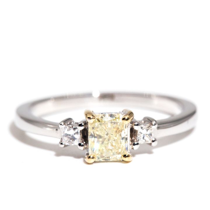 0.58 Carat Certified Radiant Cut Yellow Diamond Ring