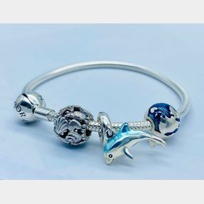 ORIGINAL PANDORA MOMENTS SILVER CLASP BRACELET WITH 3 OCEAN COLLECTION CHARMS.22.5G