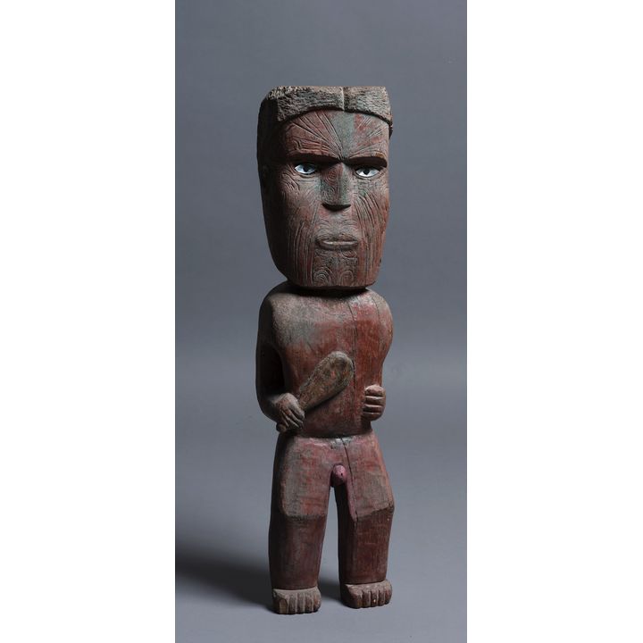 Tekoteko - Standing figure holding Patu or Mere