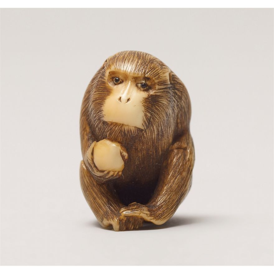 An ivory ojime of a monkey. 19th century