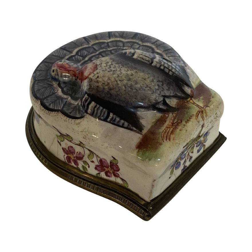 An 18th century South Staffordshire enamel bonbonnière in the form of a turkey