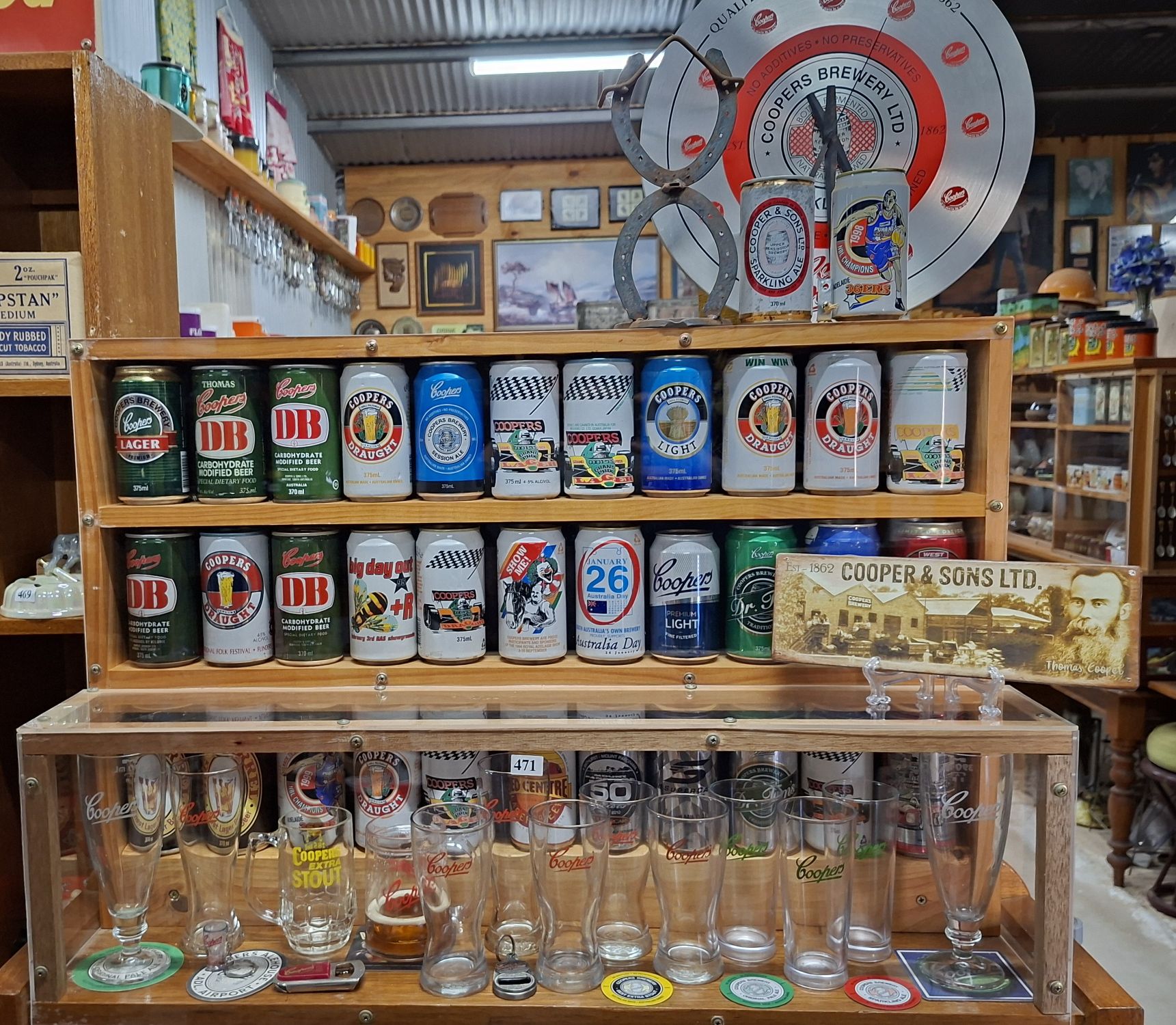Collection Of Vintage Beer Cans And Glasses