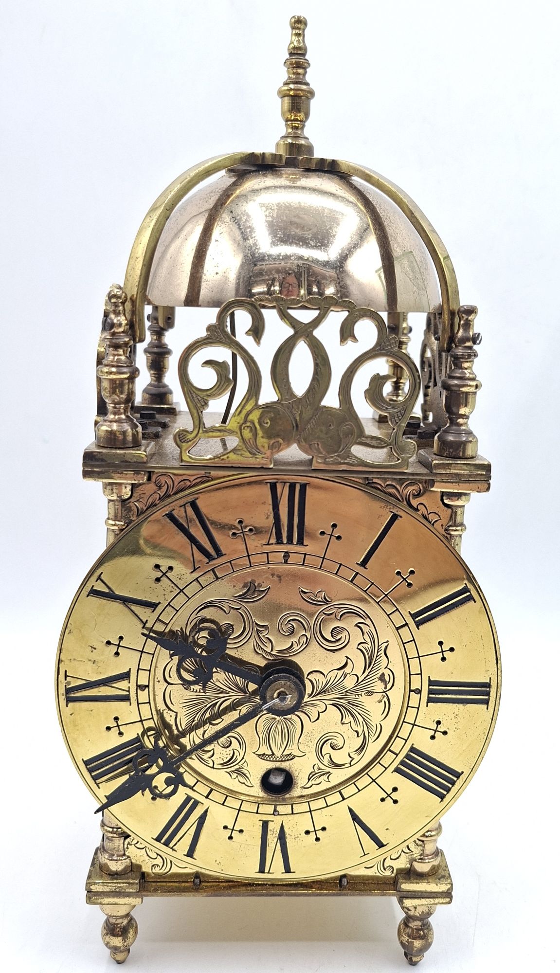 145 · A BRASS LANTERN CLOCK