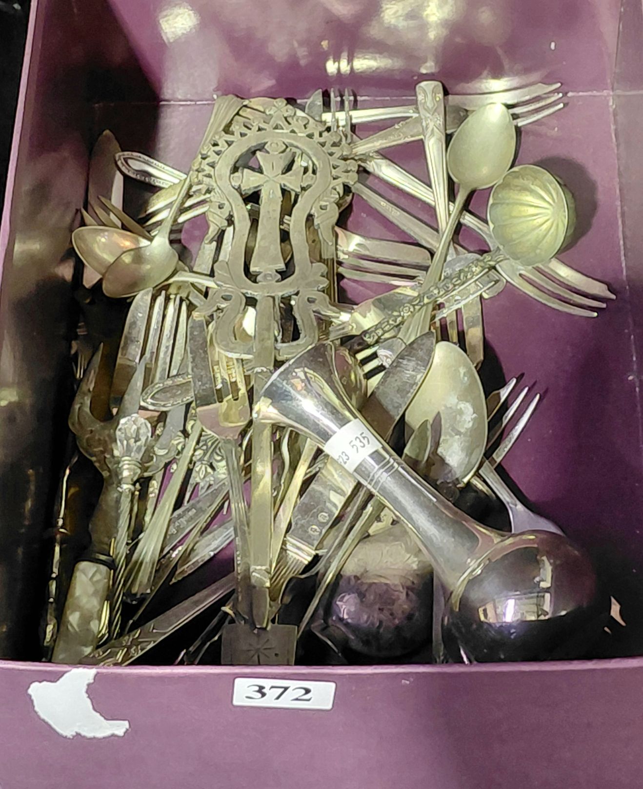 372 · STERLING SILVER FORK AND SILVERPLATED ITEMS