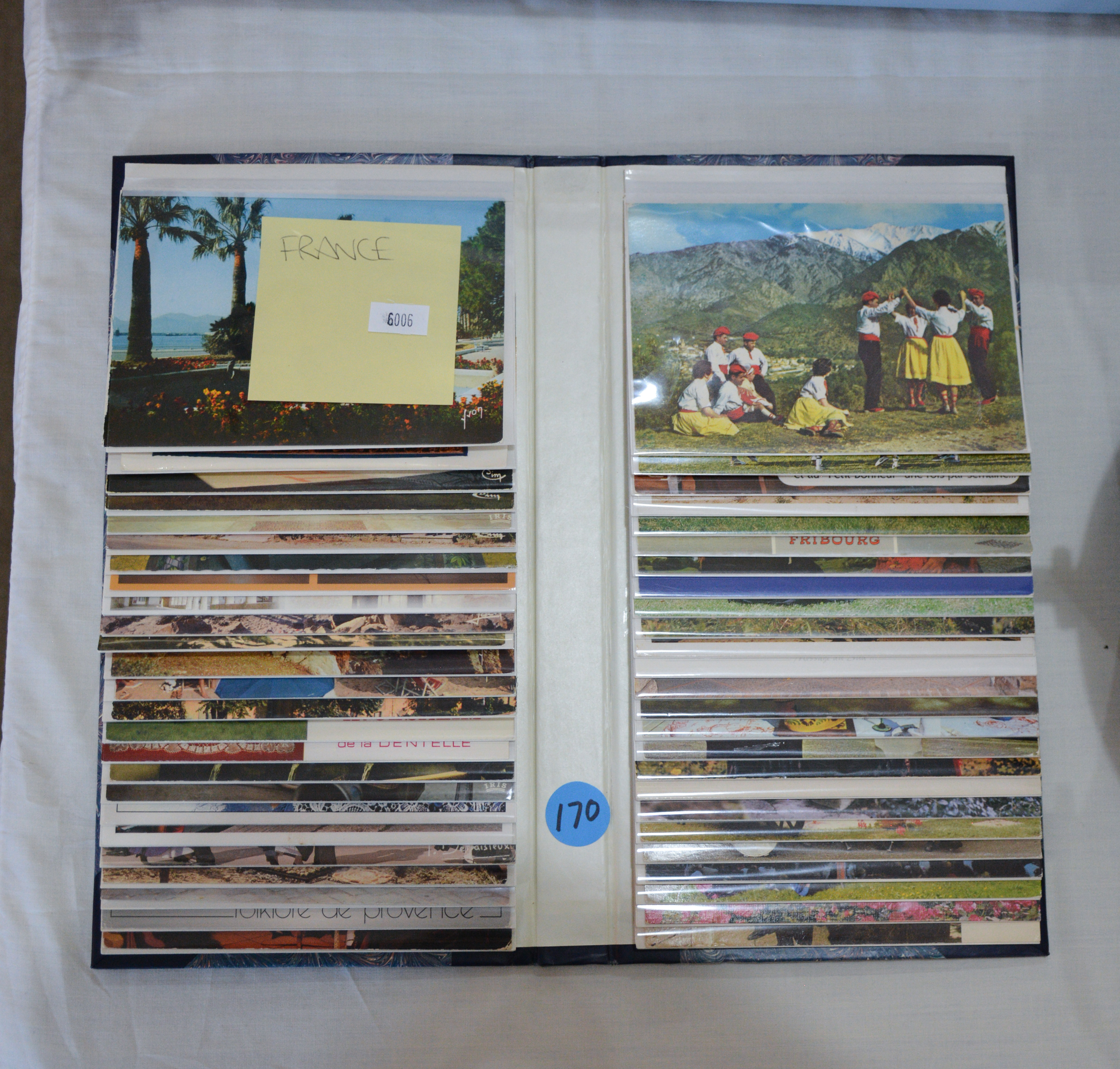 France Postcards in Album — sold at auction in New Zealand for $20