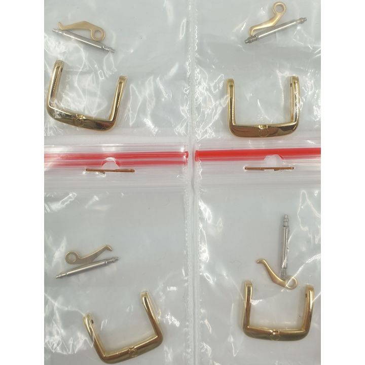Omega (NOS) Signed Gold Plated Buckles (x4)