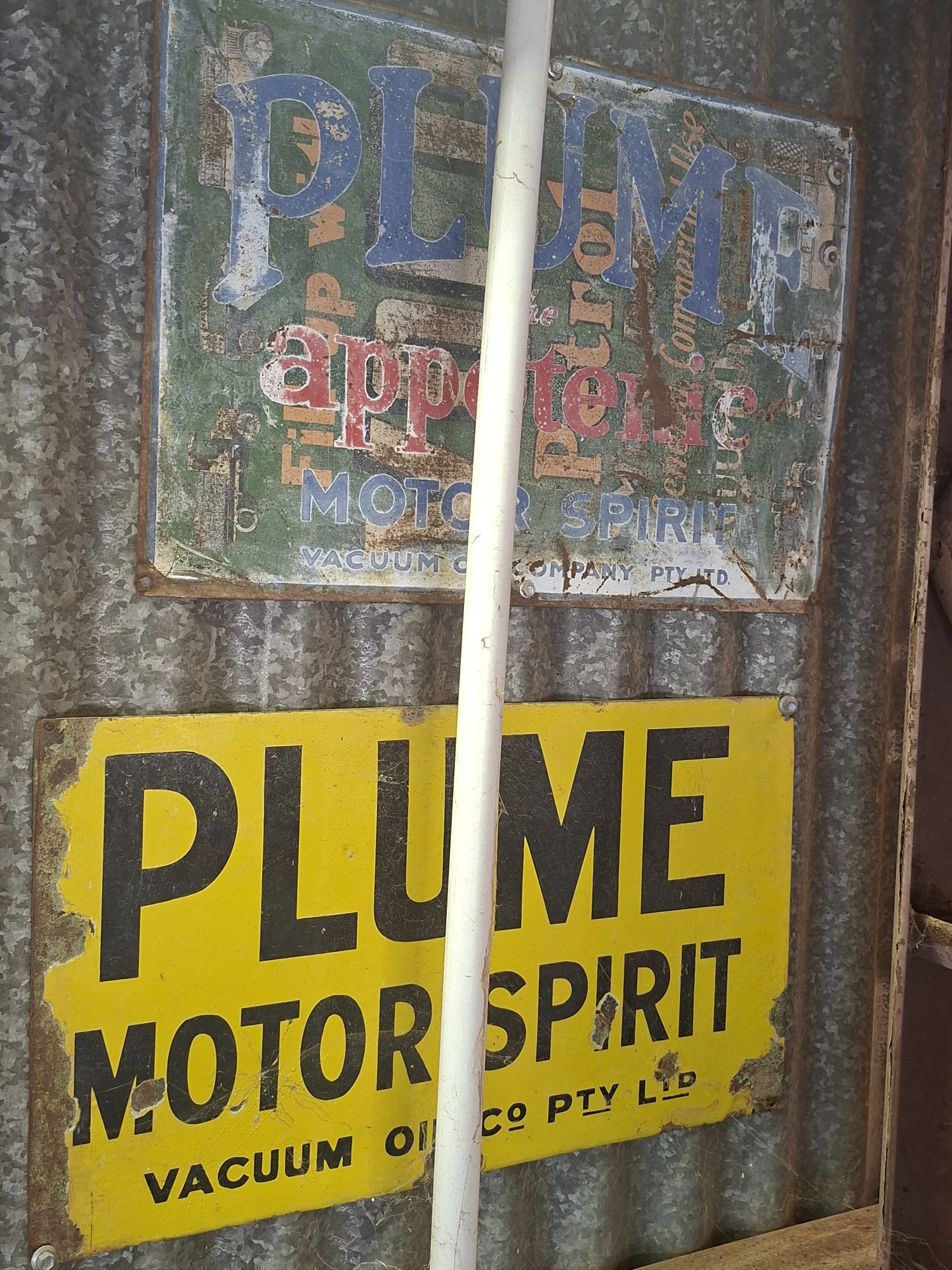 Plume Motor Spirit Sign