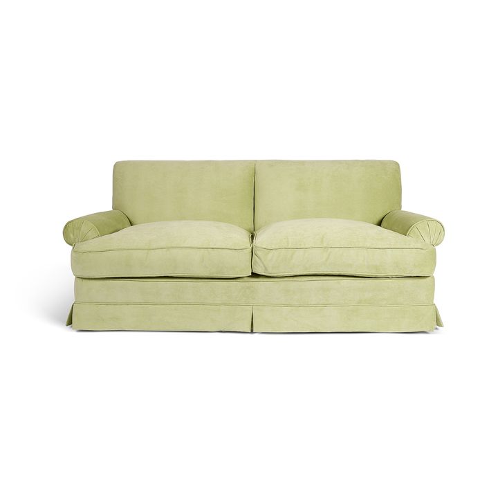 A mid 20th century pale green two seater-settee in the manner of Howard & Sons Ltd