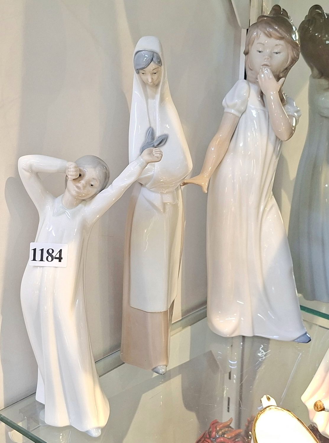 Three Nao Figurines