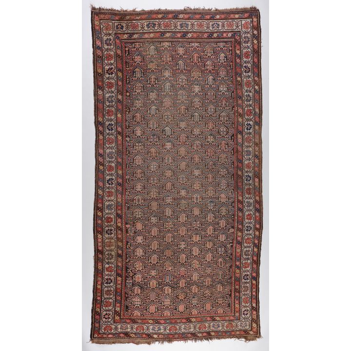 A large Oriental hand knotted rug