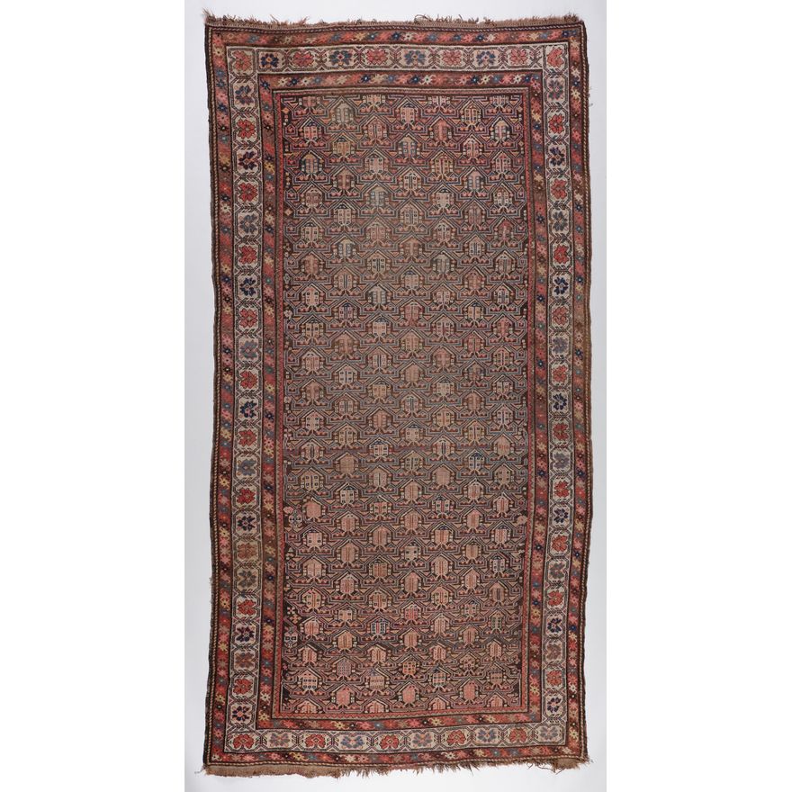 A large Oriental hand knotted rug