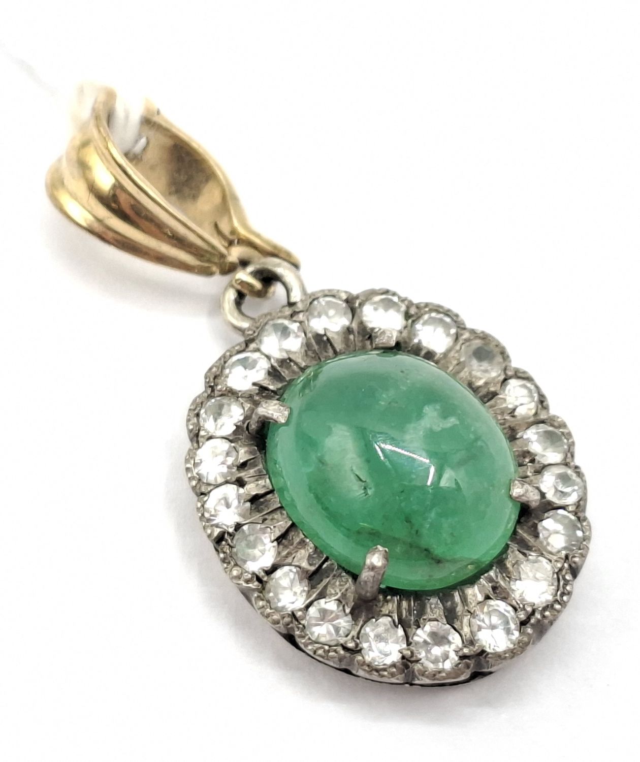 1013 · 9CT GOLD AND SILVER STONE SET PENDANT