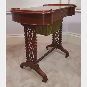 A VERY FINE 19TH CENTURY ROSEWOOD ‘WORK’ TABLE, the top with curved ends having raised gallery edge, a single