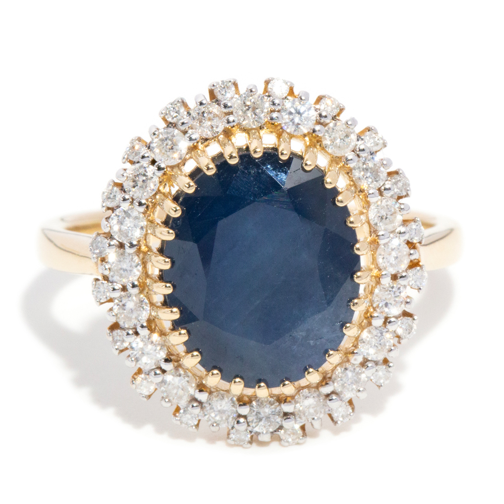 86 · 4.2 Carat Sapphire & Half Carat Diamond Halo 14ct Gold Ring