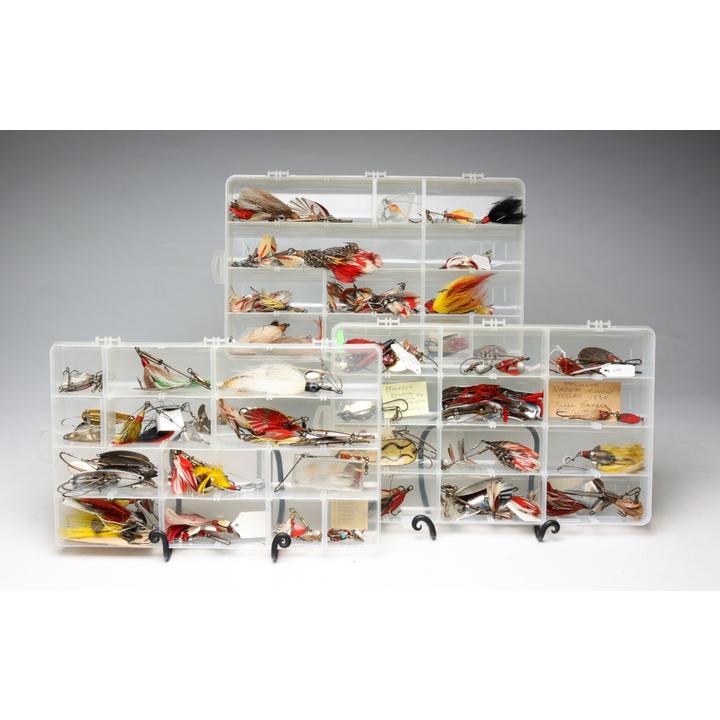 Grouping Of jitterbug Lures In Display Cases.