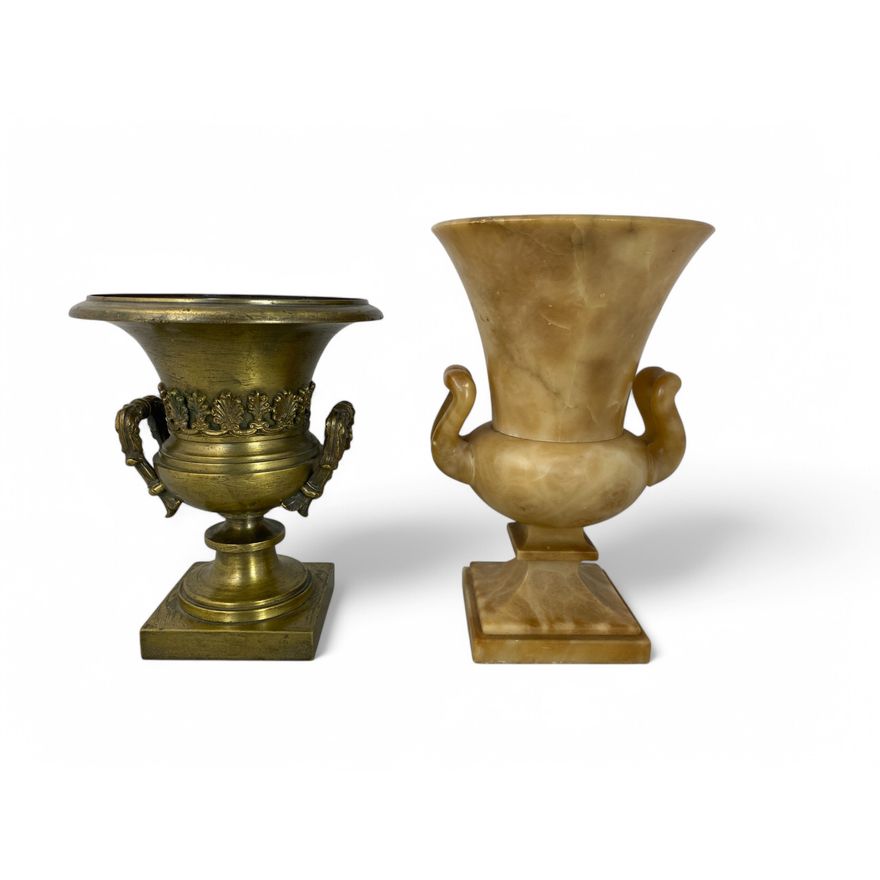 A 19th century gilt brass twin-handled urn vase and a similar marble example