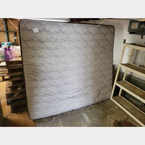 Queen size mattress. Clean on top. Edge might be a little dusty