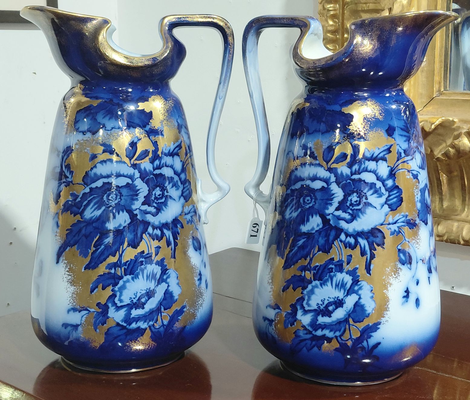 671 · ART NOUVEAU FLOW BLUE JUGS