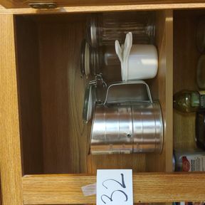 Sifter, sugar containers, measuring glasses, misc glassware