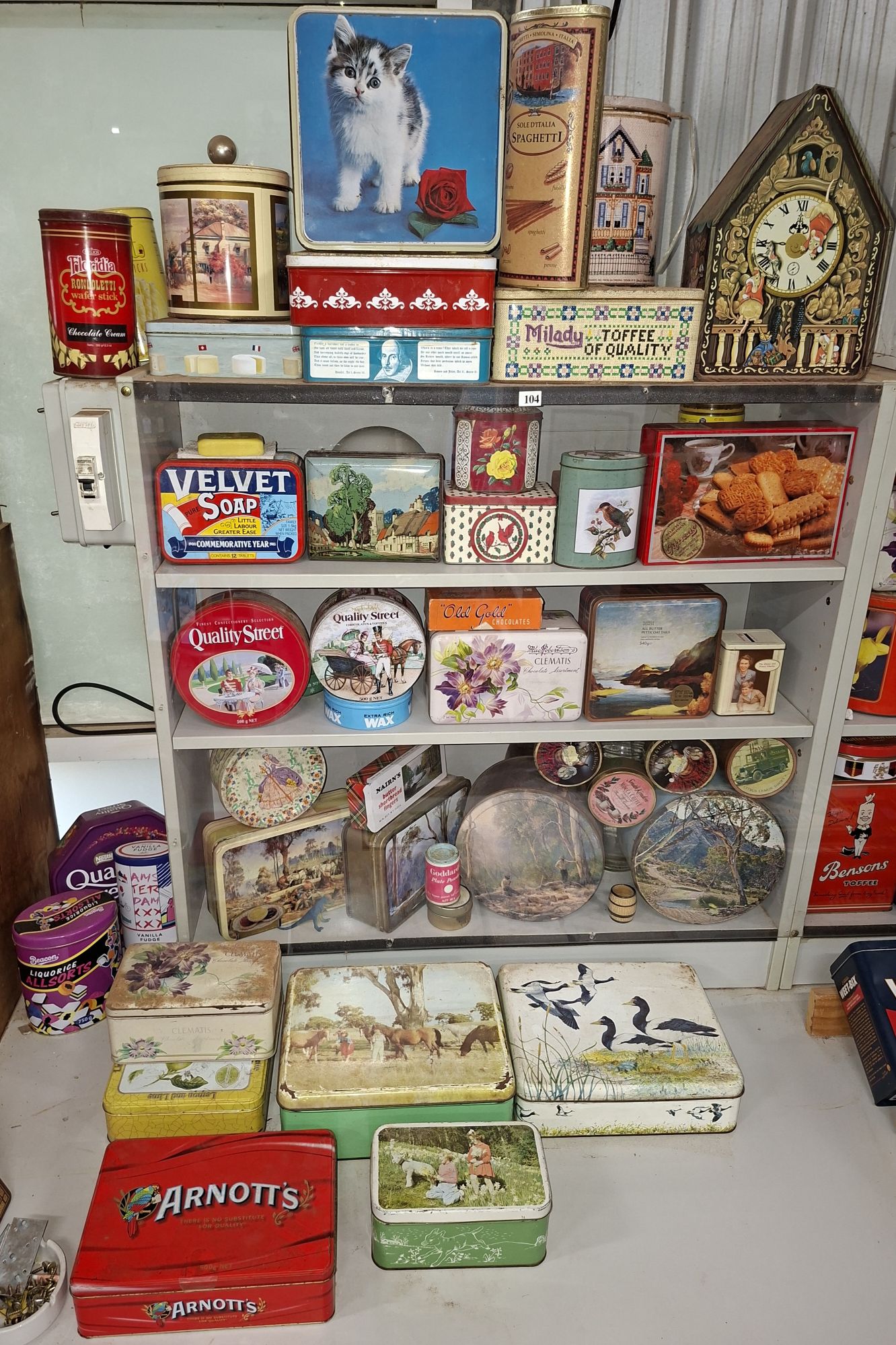 104 · LARGE QUANTITY OF TINS
