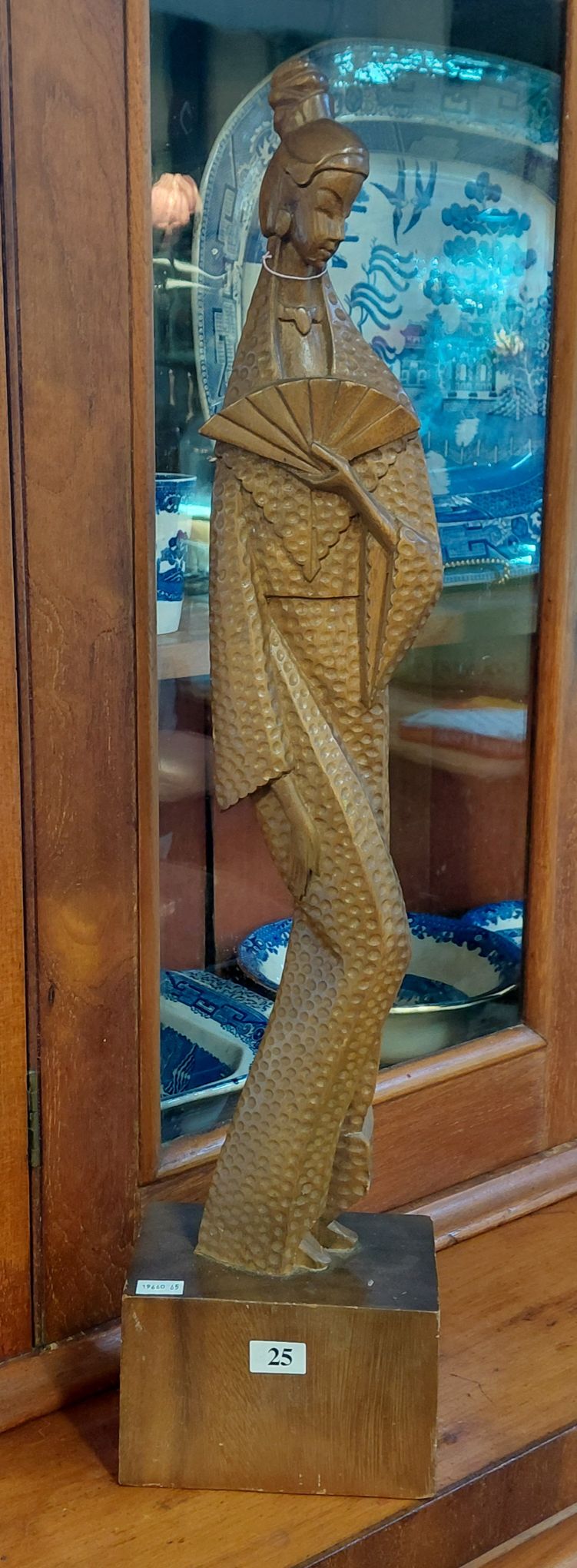 25 · WOODEN SCULPTURE