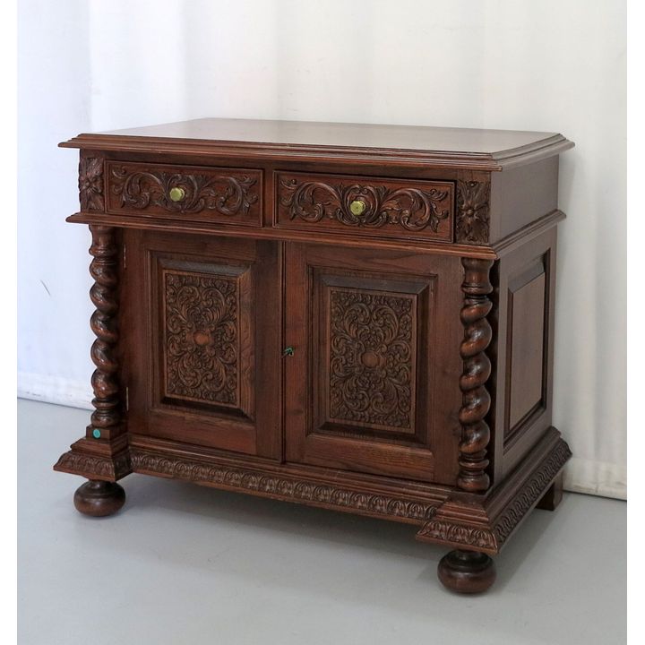 CARVED OAK TWO-DOOR SIDE CABINET