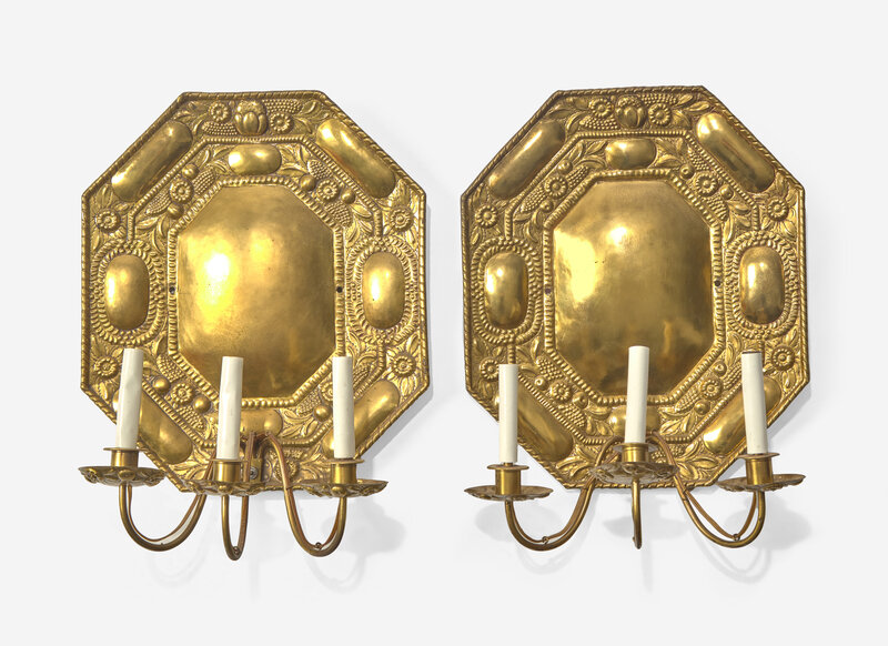 A Pair of Continental Repoussé Decorated Brass Three-Light Sconces