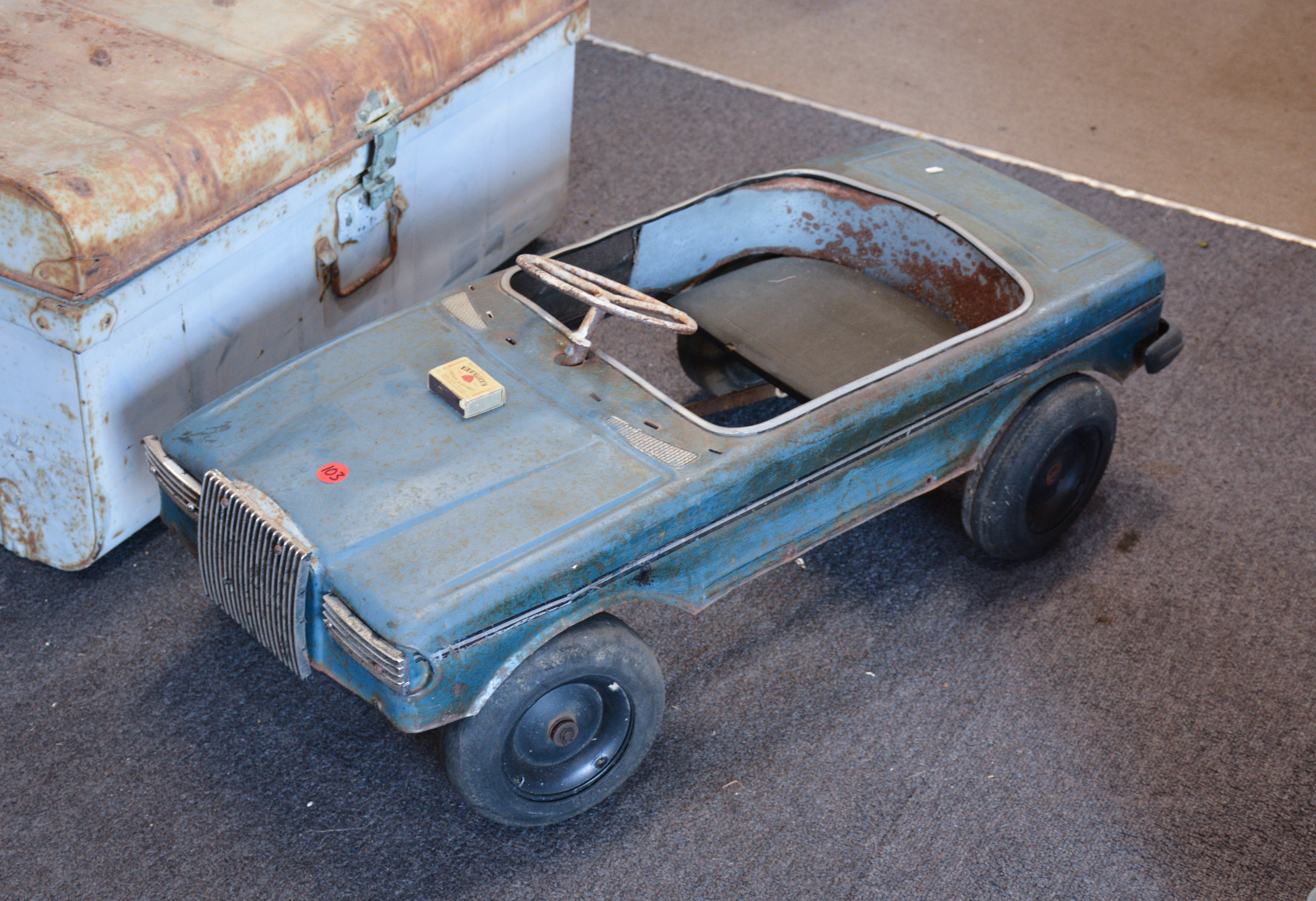Vintage Metal Ride-On Car — sold at auction in New Zealand for $65