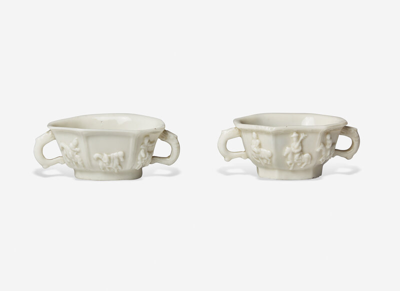 Two Similar Chinese Dehua Porcelain Twin Handled Cups