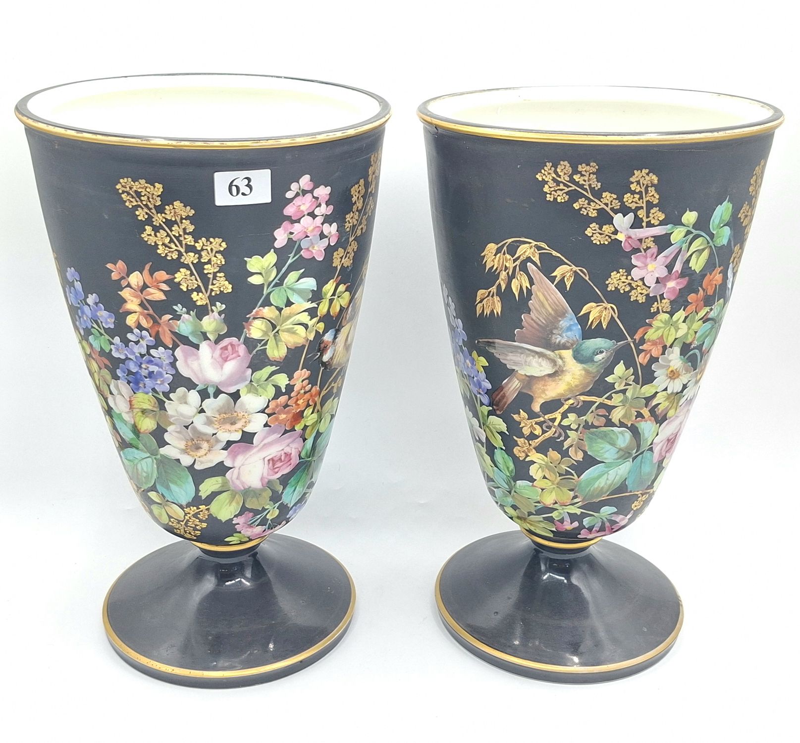 63 · A PAIR OF ANTIQUE MANTLE VASES