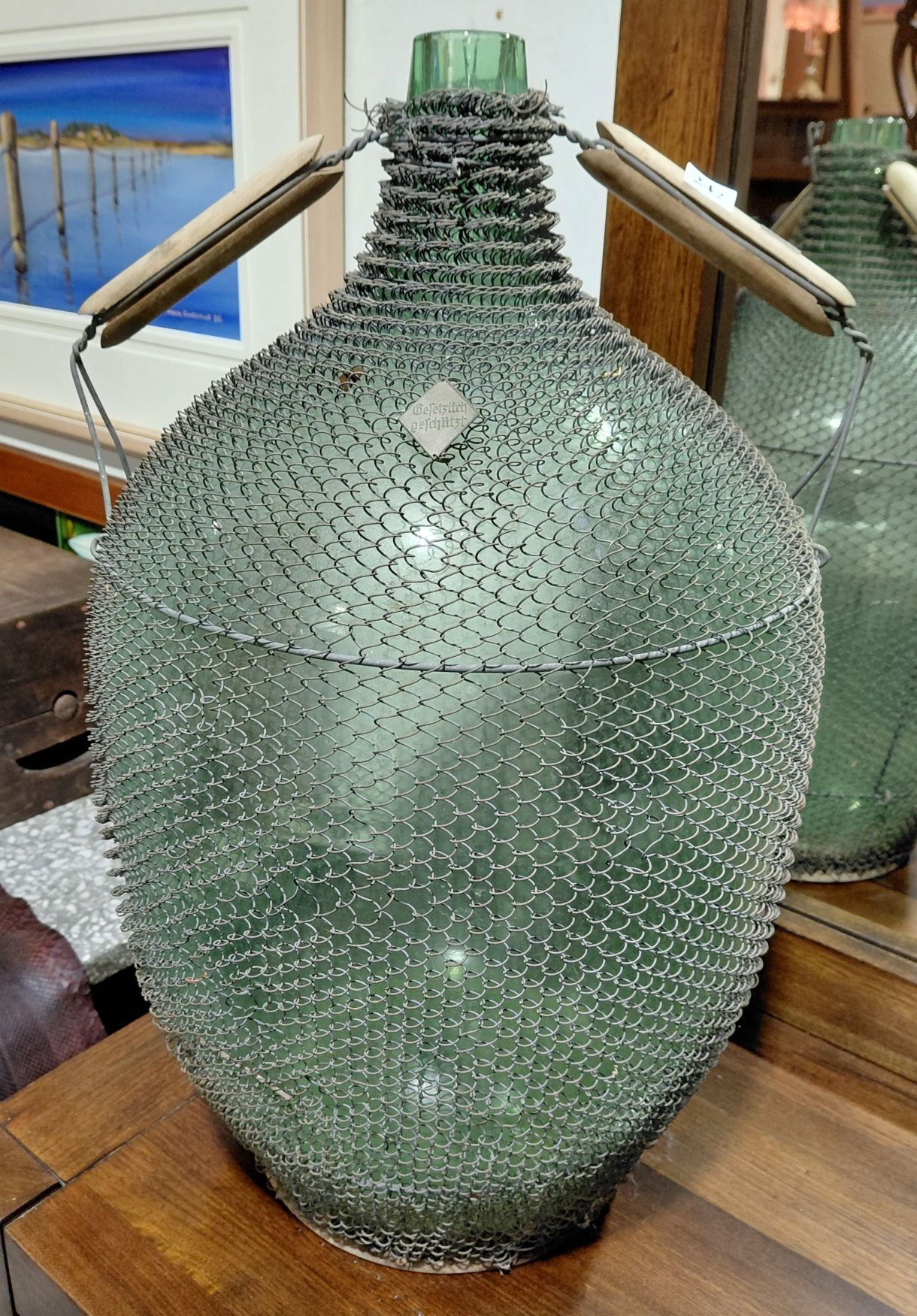 242 · GREEN GLASS DEMI JOHN
