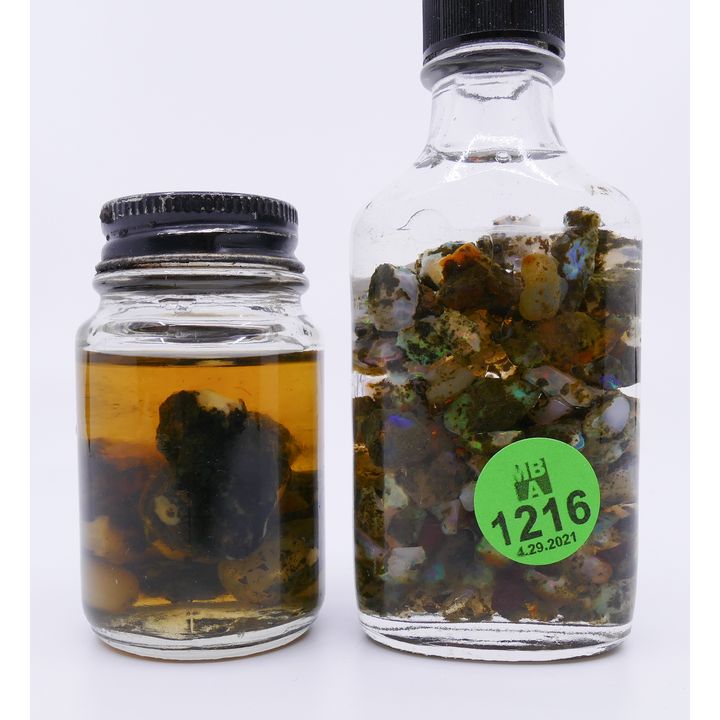 2 Bottles Opals Specimens in Water