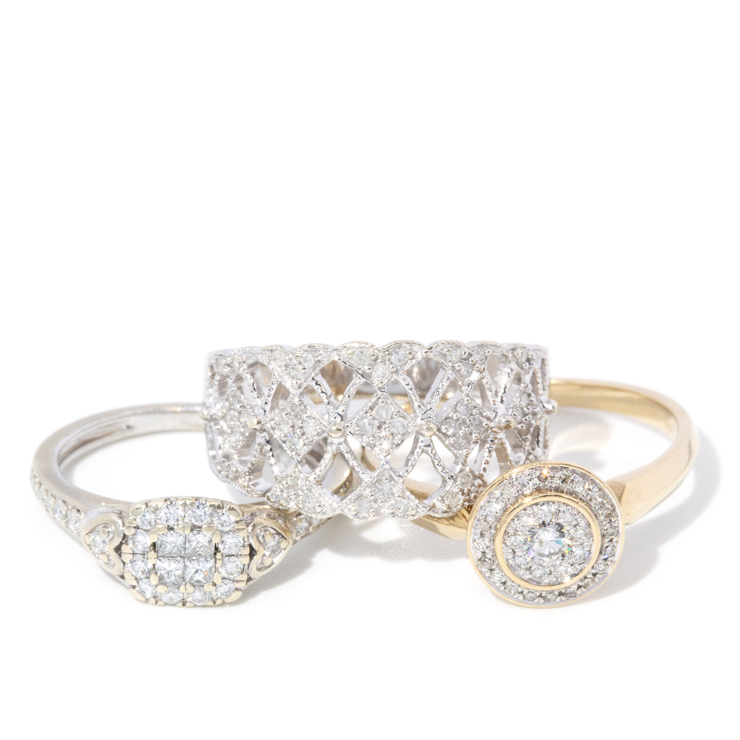 Three 9 carat gold diamond rings