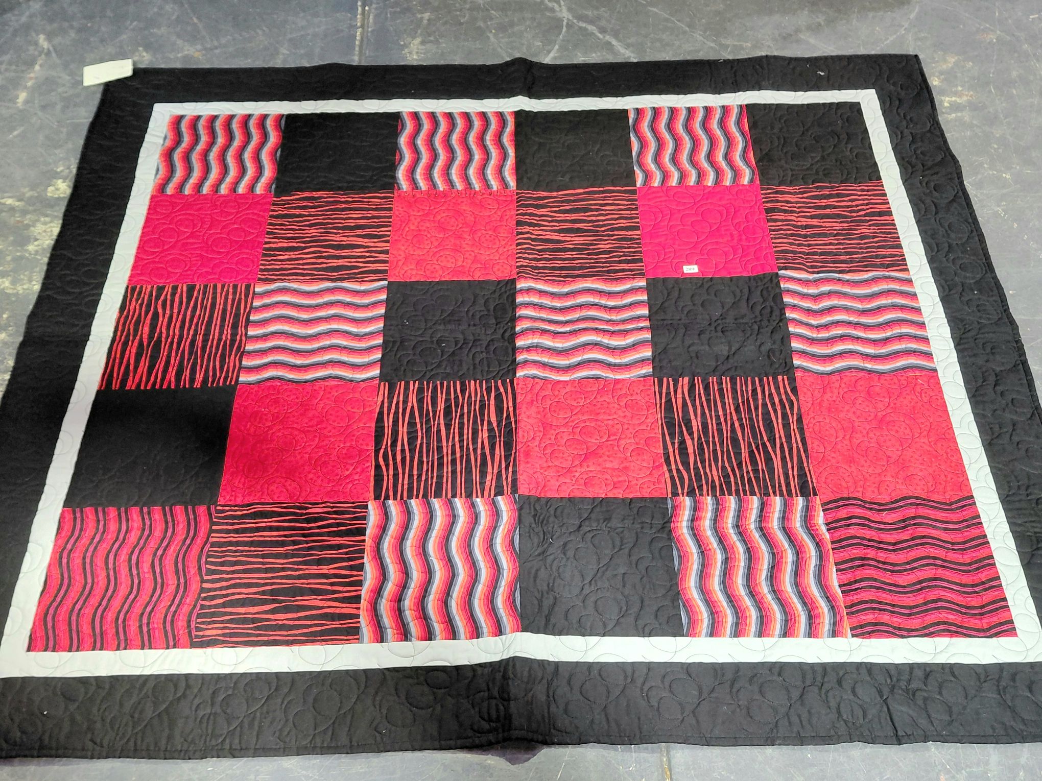 289 · HAND MADE QUILT