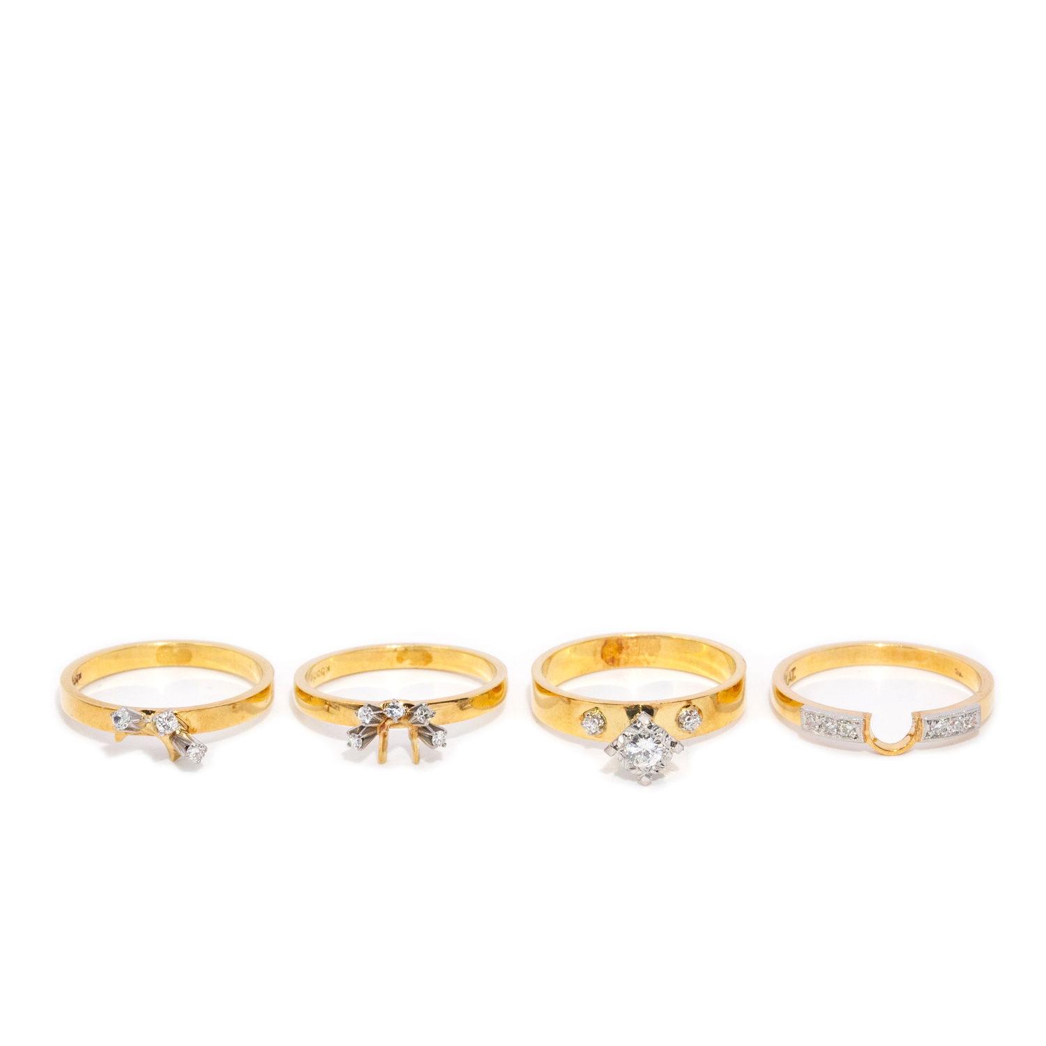 Four 18ct Gold Rings