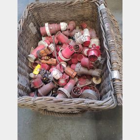WICKER BASKET WITH ASSORTED POWER PLUG ATTACHEMENTS