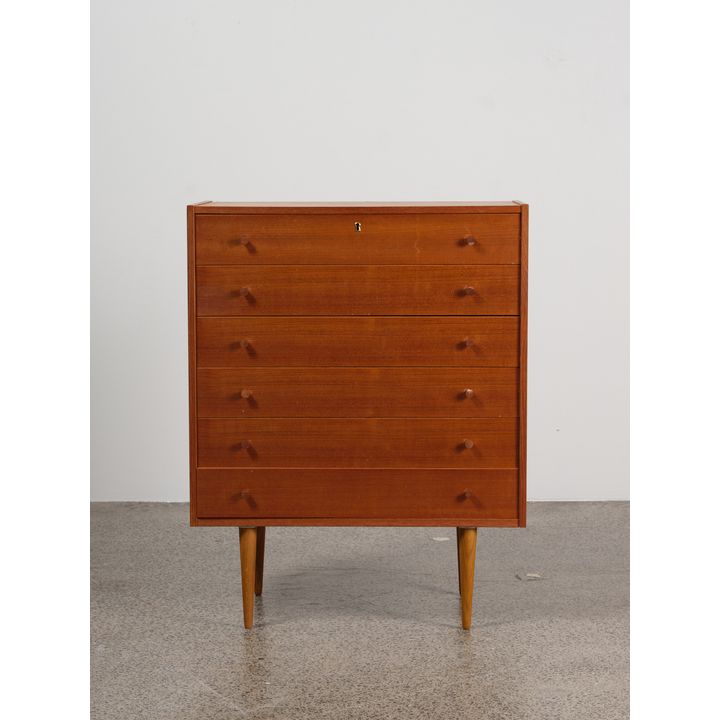 A 1950s Danish teak chest of drawers or tallboy