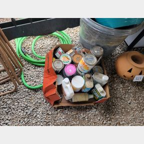 Short garden hose and paint & stain containers