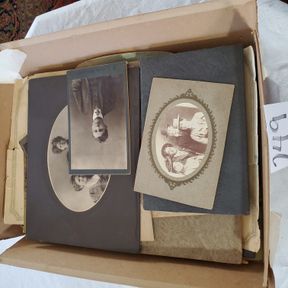 Old time family photos and other old paperwork
