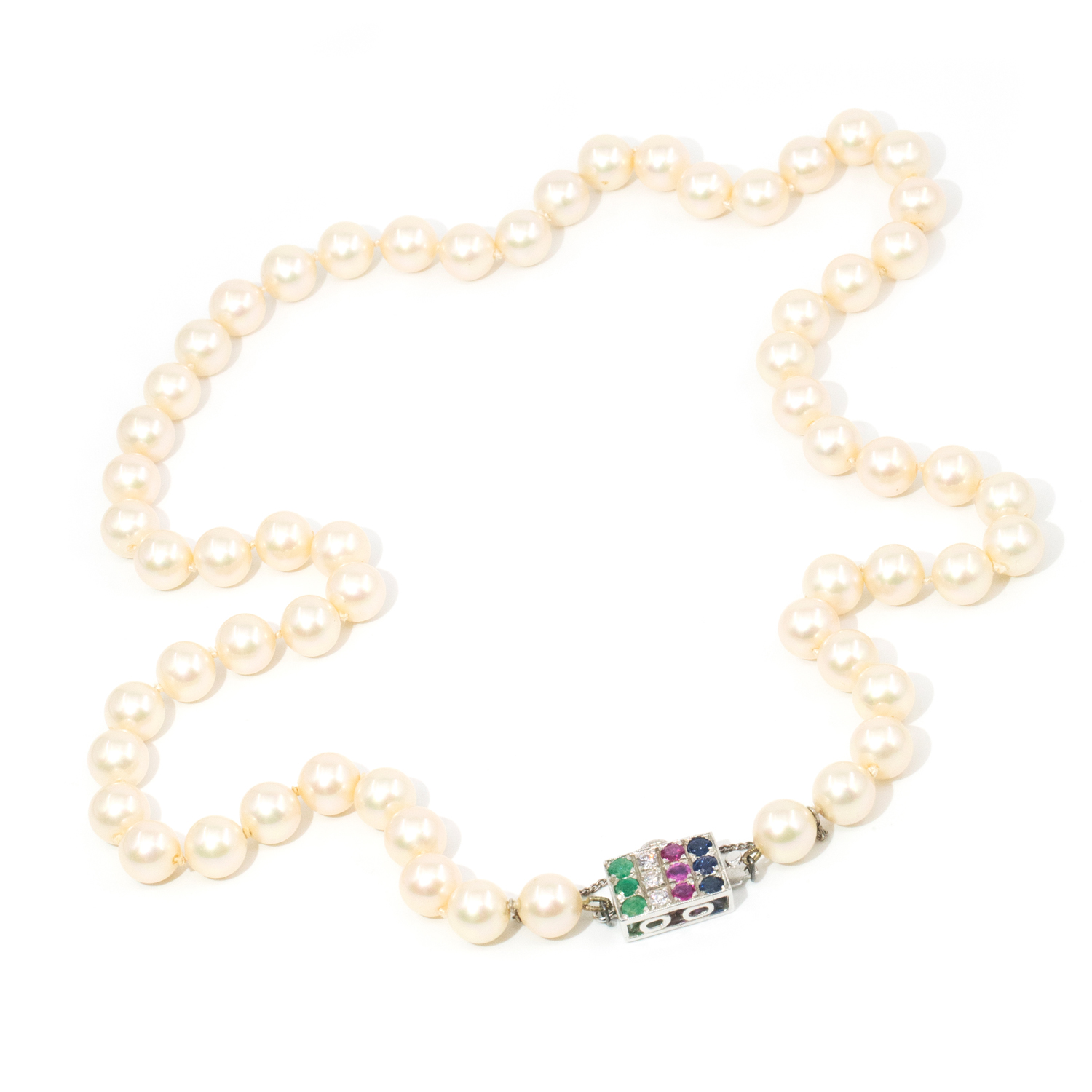 66 · Imitation pearl strand with a 14 carat white gold mixed gemstone clasp
