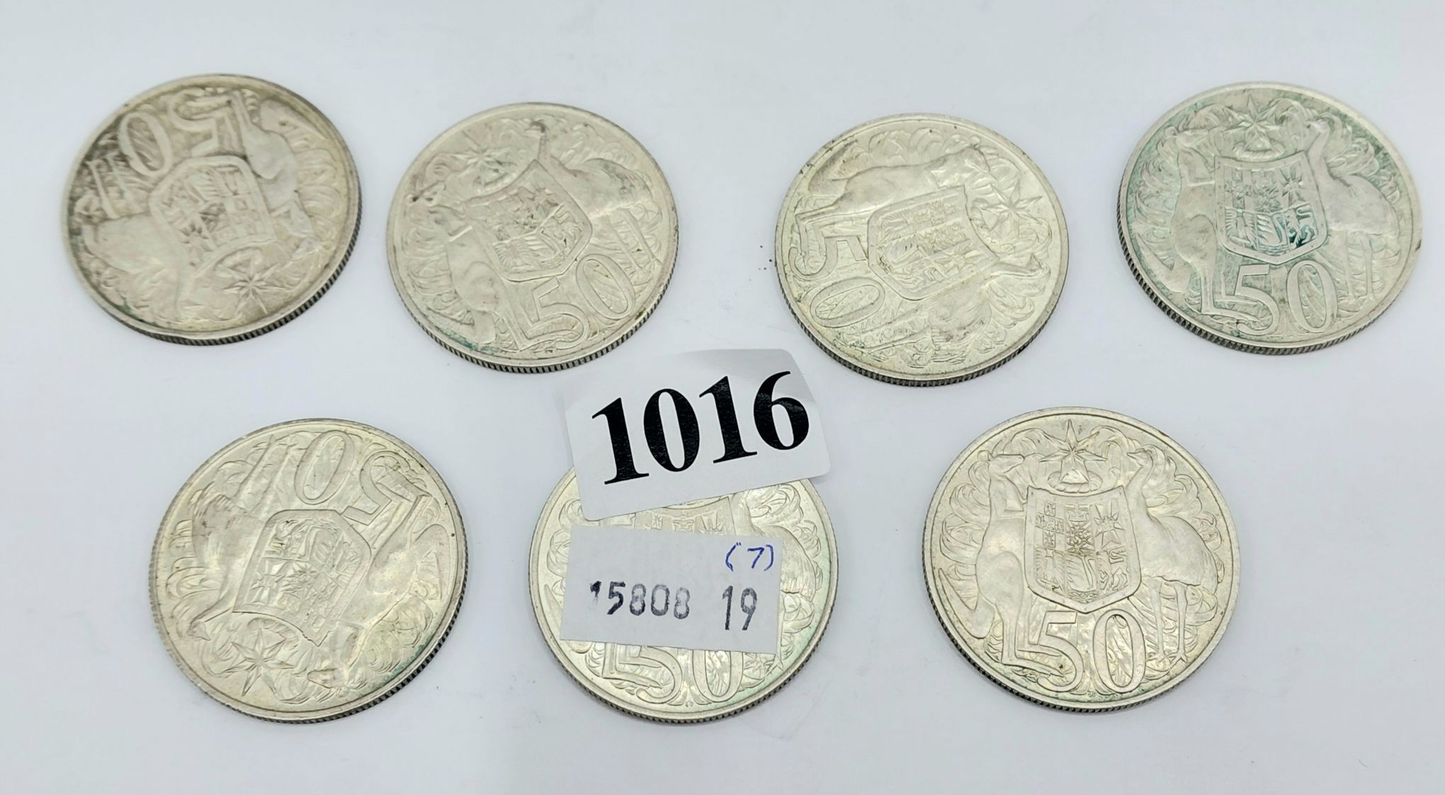 Seven Round 50 Cent Pieces