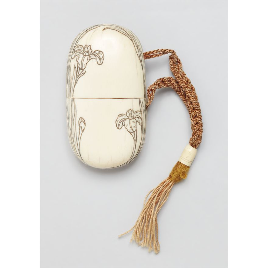 An ivory inrô-shaped shunga object. Around 1900