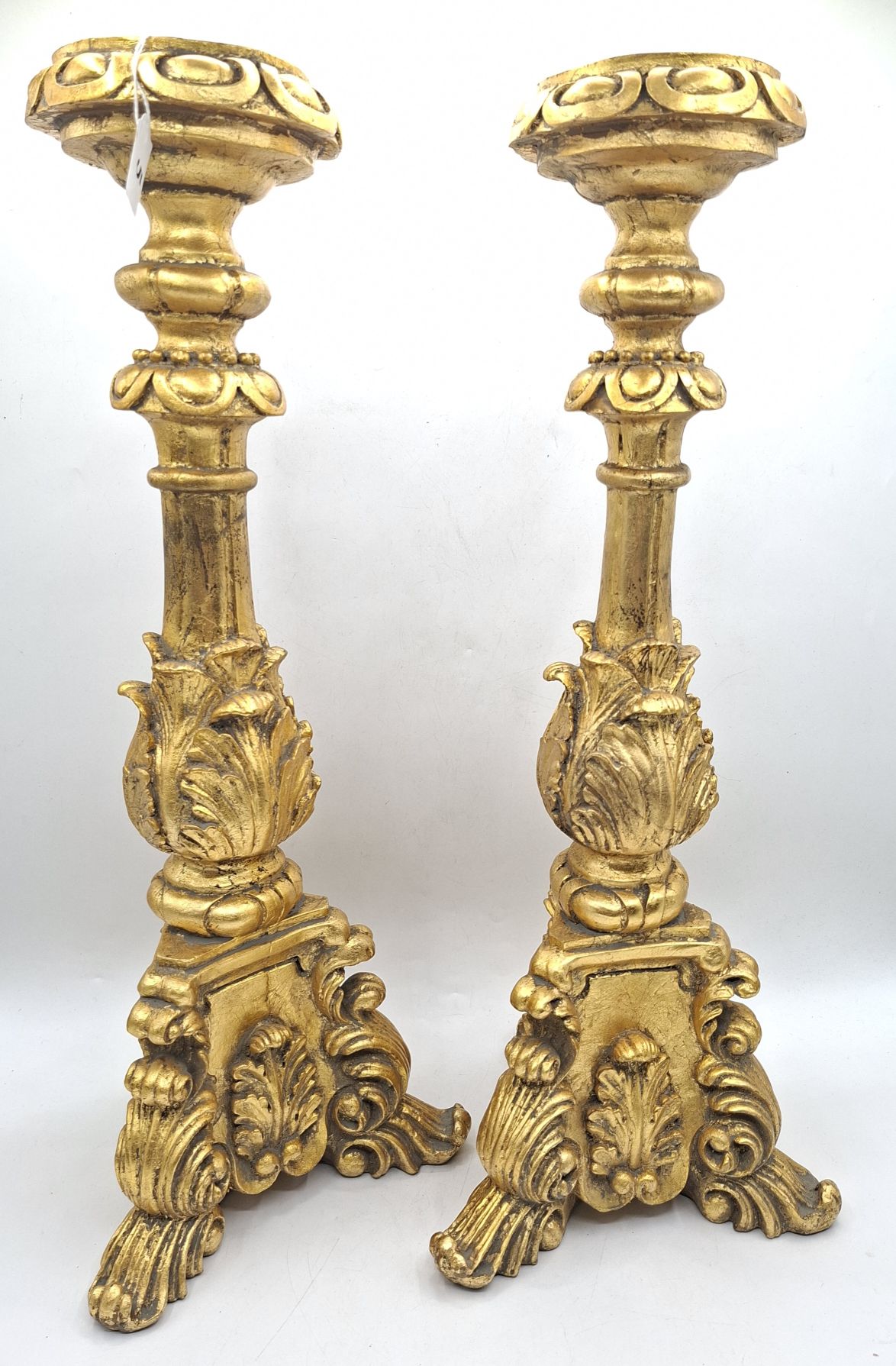 5 · A PAIR OF GILT CANDLESTICKS