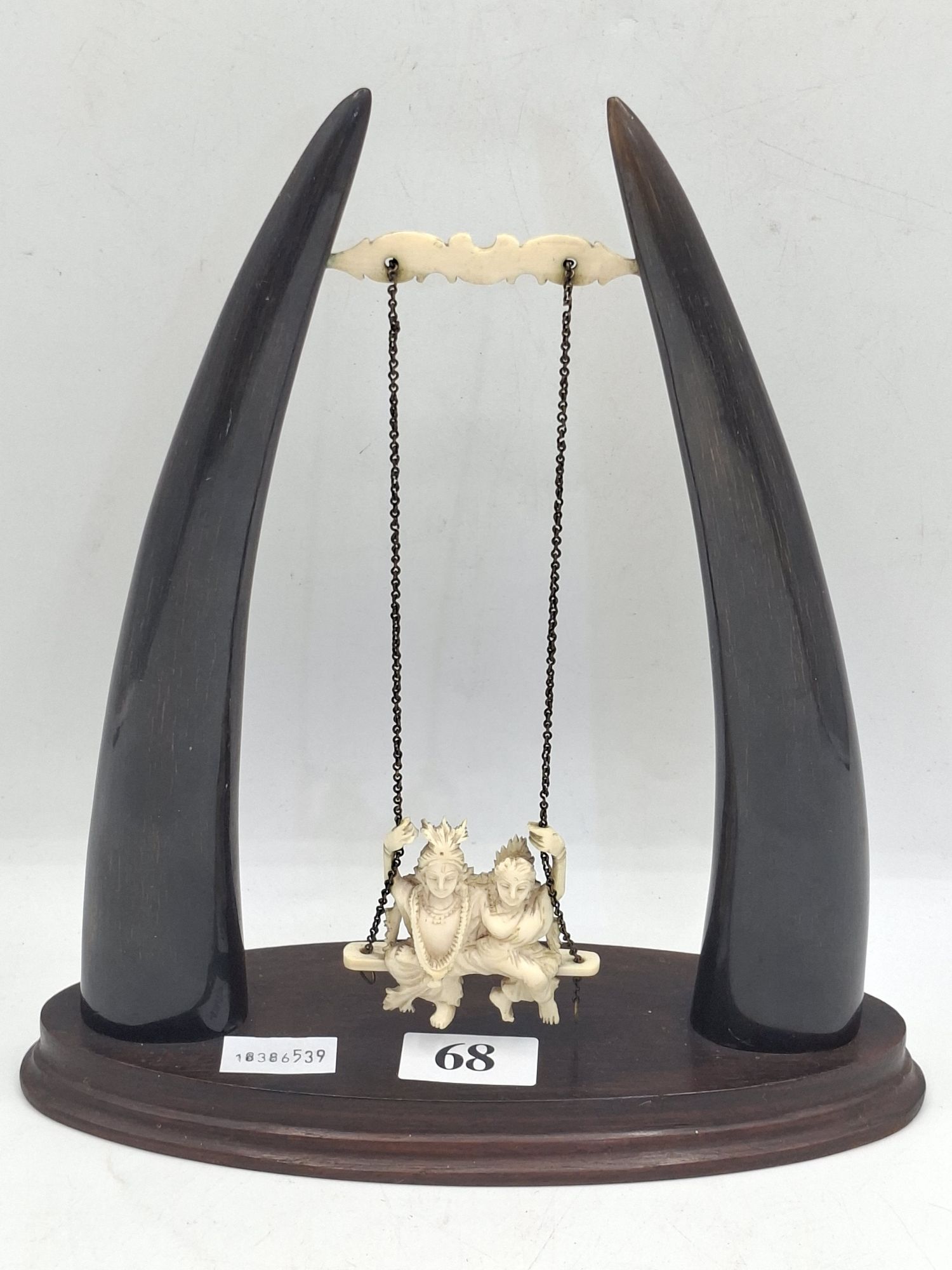 A Carved Ivory And Horn Ornament