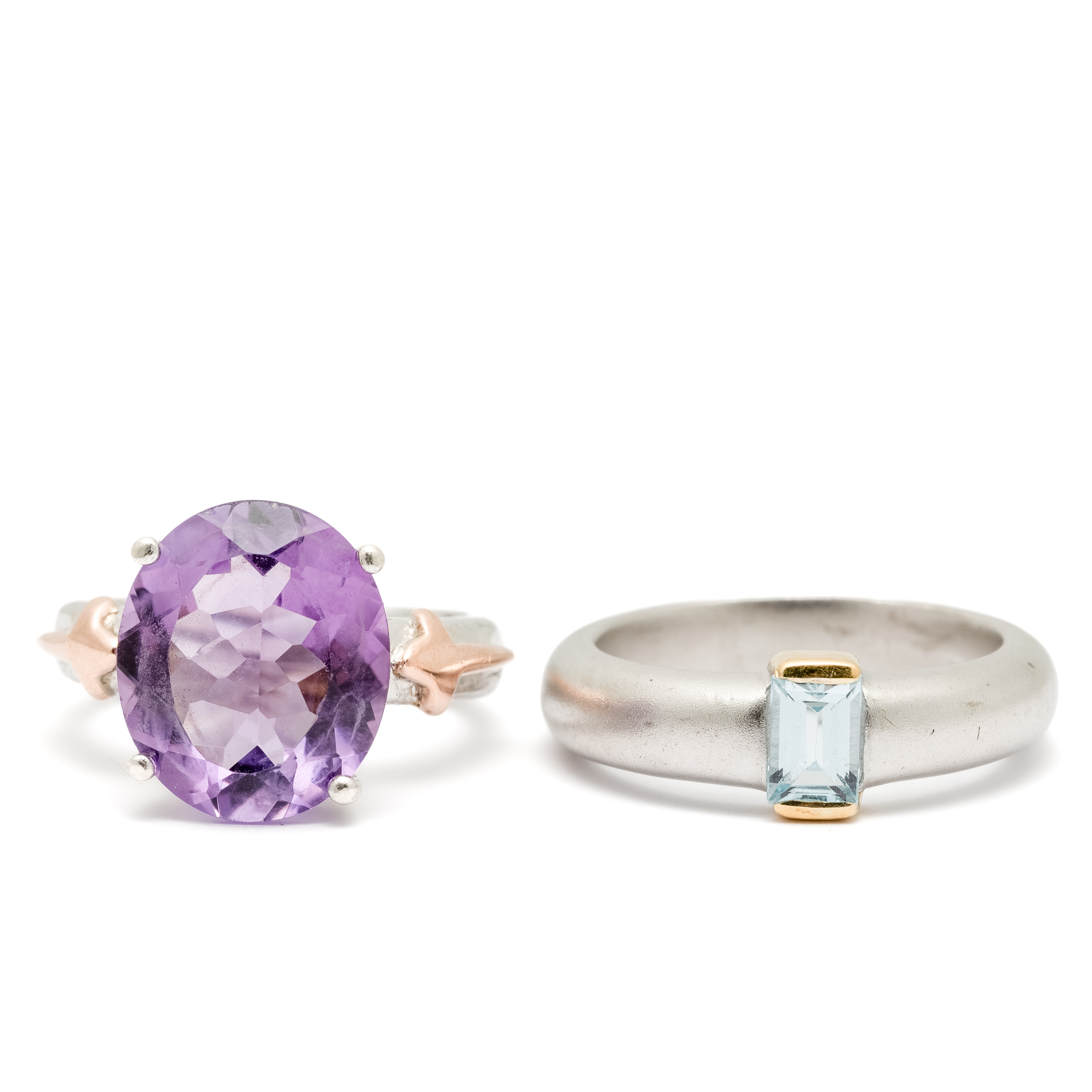 263 · Two Silver Amethyst & Topaz Rings