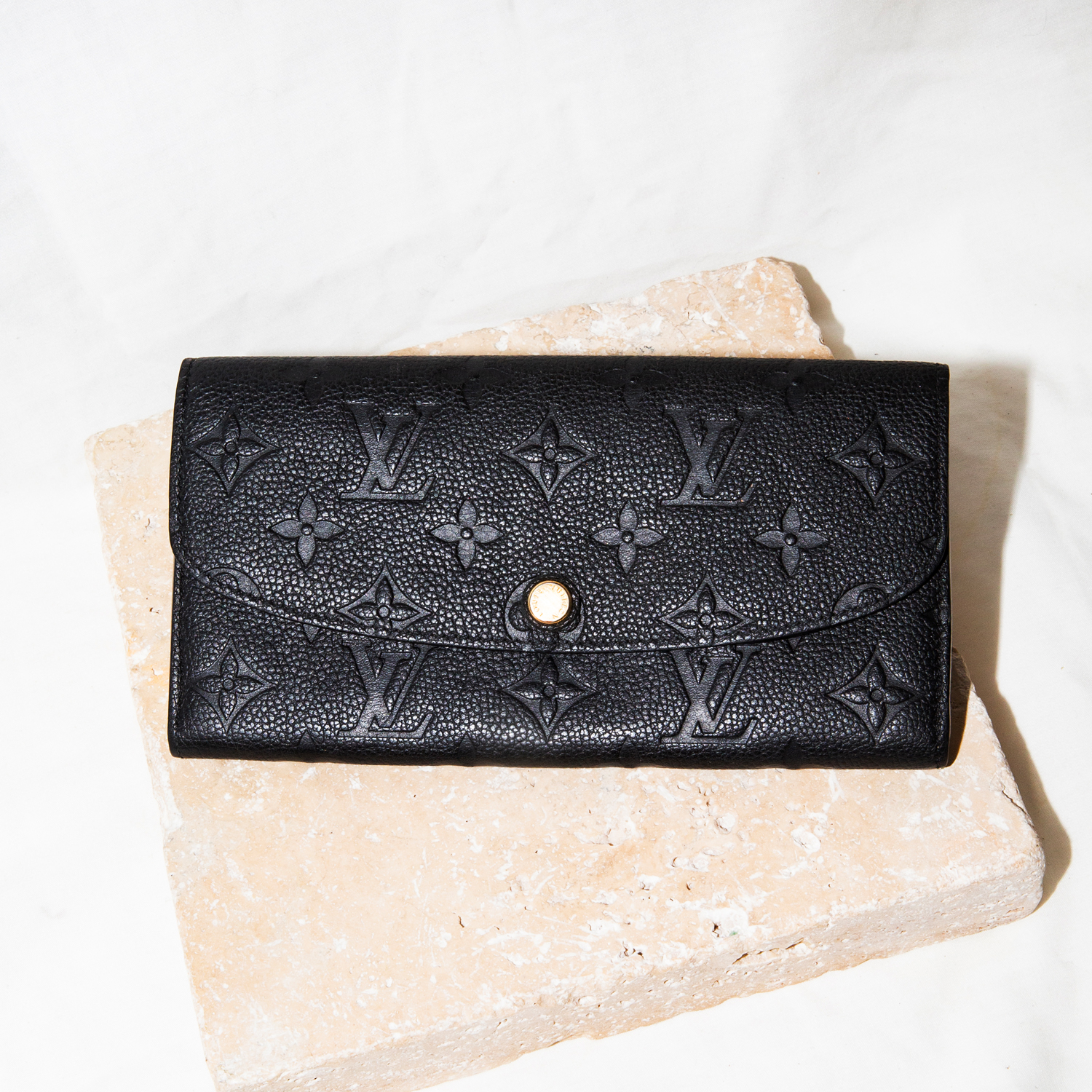67 · Louis Vuitton "Emilie" Wallet in Black