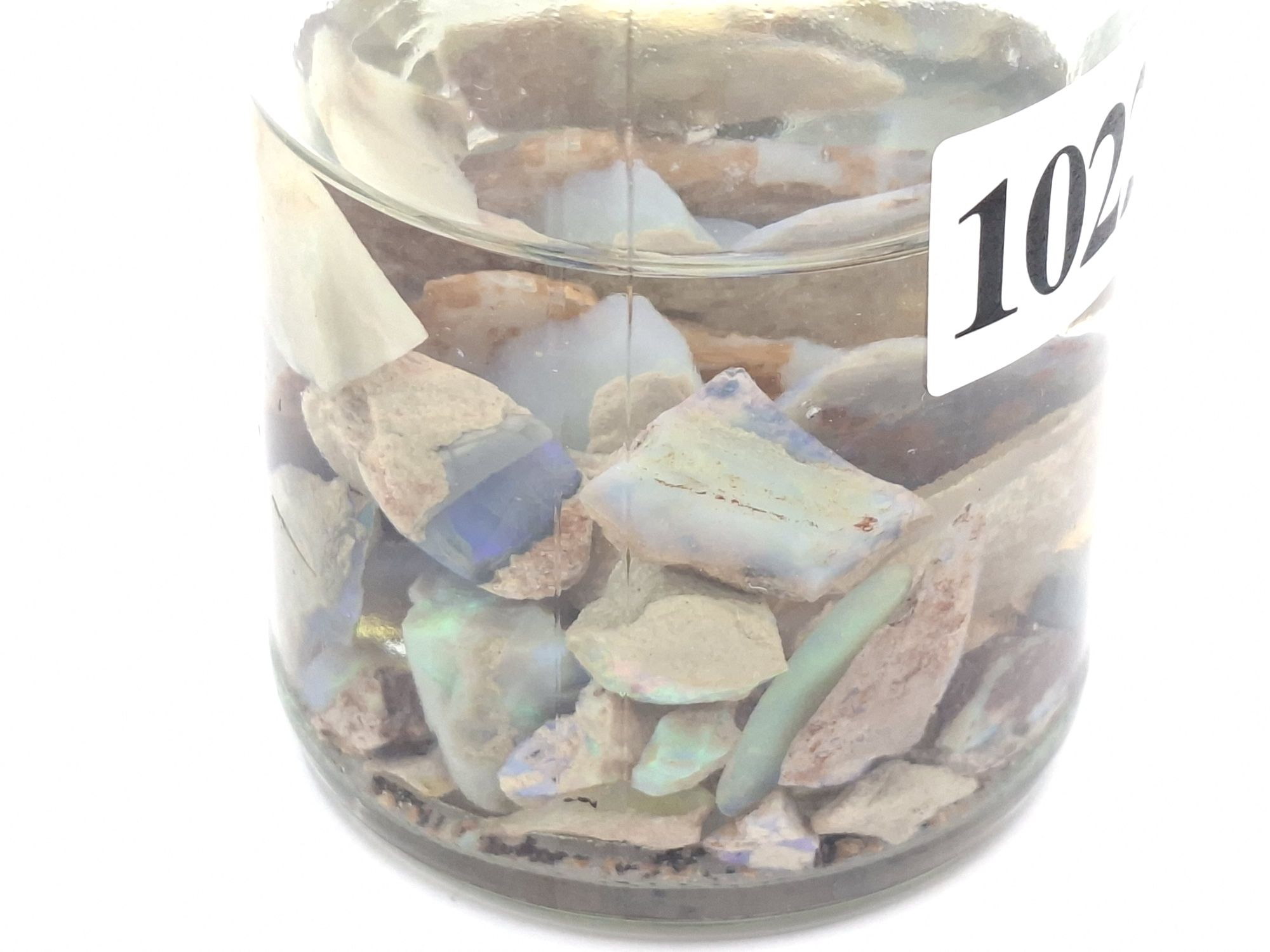 OPAL SPECIMENS IN JAR