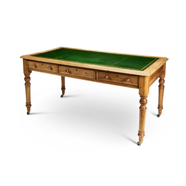 A Victorian oak library writing table